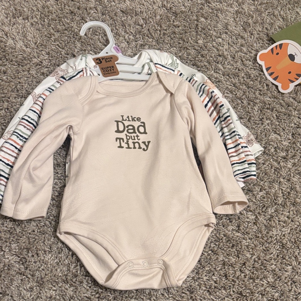 Cream Long Sleeve Baby Onesie